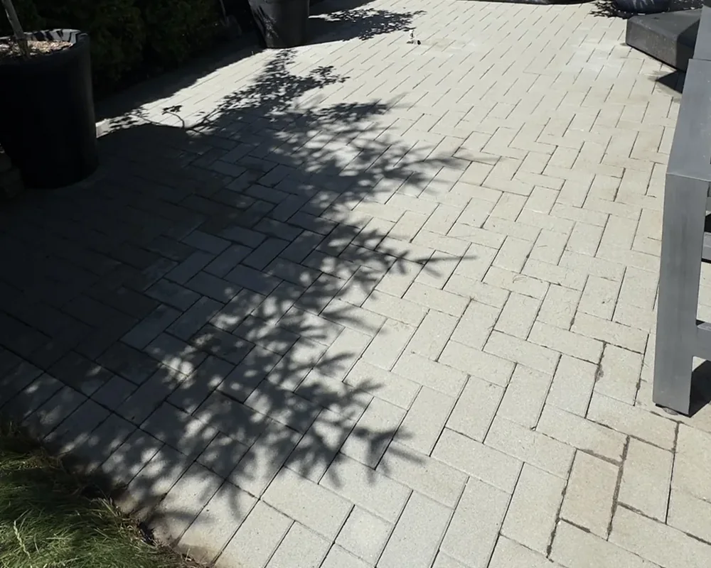 Clean paver patio after weeds were removed and the surface was pressure washed